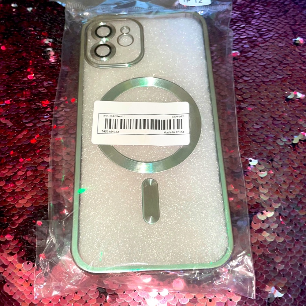 IPHONE 12 charging phone case CLEAR with silver on the charging circle on back:)